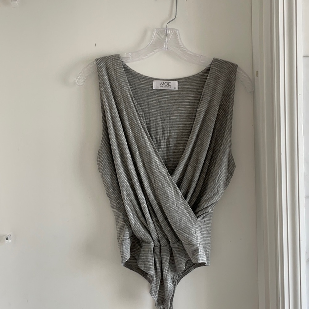 Brand new never worn before bodysuit